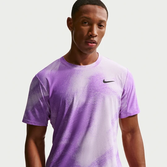 Zdjęcie produktu Męska koszulka do tenisa Dri-FIT ADV NikeCourt Slam - Fiolet
