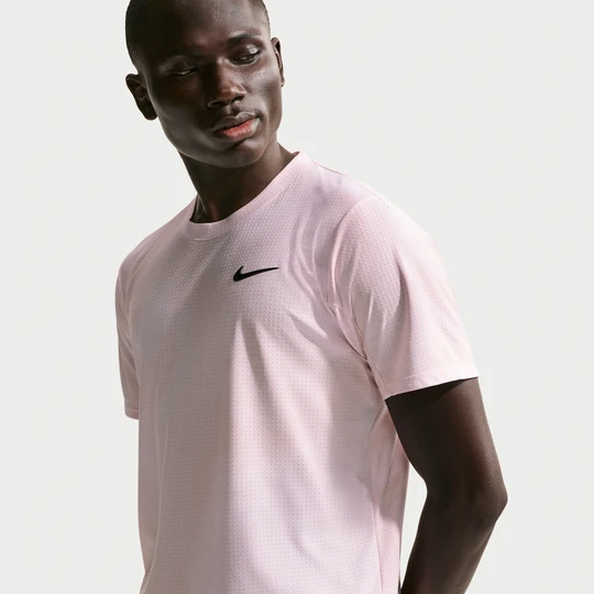 Zdjęcie produktu Męska koszulka do tenisa Dri-FIT ADV NikeCourt Slam - Różowy