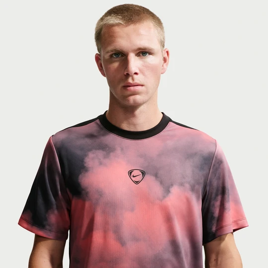 Zdjęcie produktu Męska koszulka piłkarska z krótkim rękawem Dri-FIT Nike Academy+ - Różowy