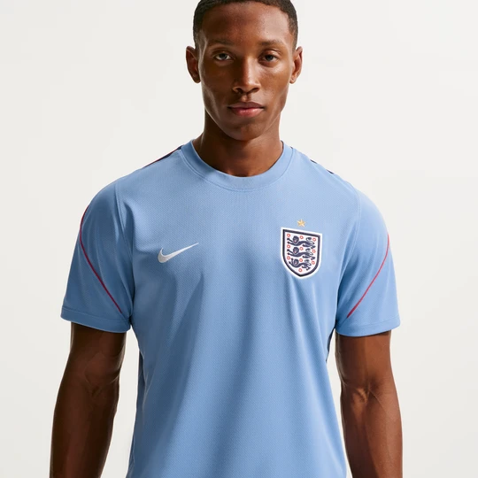 Zdjęcie produktu Męska koszulka piłkarska z krótkim rękawem Nike Dri-FIT Anglia Strike - Niebieski
