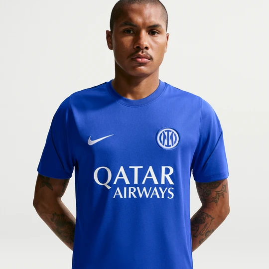 Zdjęcie produktu Męska koszulka piłkarska z krótkim rękawem Nike Dri-FIT Inter Mediolan Strike - Niebieski
