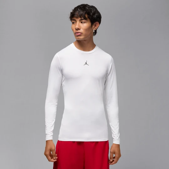 Zdjęcie produktu Męska koszulka termoaktywna z długim rękawem Dri-FIT Jordan Sport - Biel
