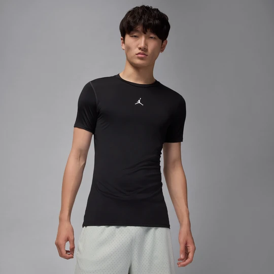 Zdjęcie produktu Męska koszulka termoaktywna z krótkim rękawem Dri-FIT Jordan Sport - Czerń