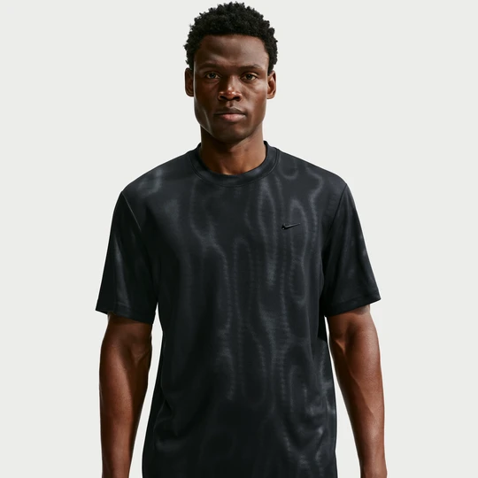 Zdjęcie produktu Męska koszulka treningowa z krótkim rękawem Nike N.A.C. Primary Dri-FIT - Czerń