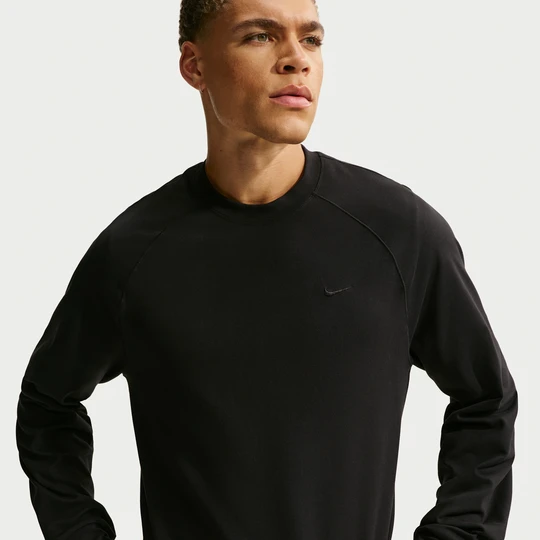 Zdjęcie produktu Męska koszulka z długim rękawem i ochroną przed promieniowaniem UV Dri-FIT Nike Primary NanoKnit - Czerń