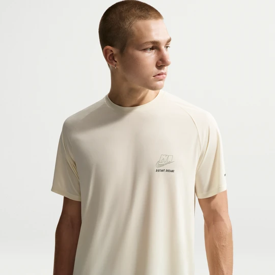 Zdjęcie produktu Męska koszulka z krótkim rękawem do biegania Dri-FIT ADV Nike Stride - Biel