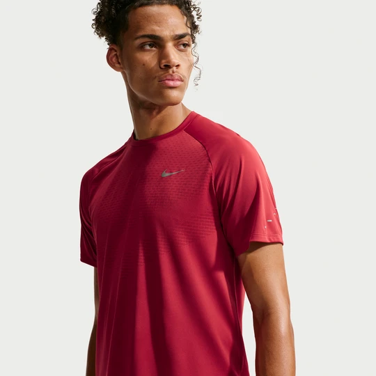 Zdjęcie produktu Męska koszulka z krótkim rękawem do biegania Dri-FIT ADV Nike Stride - Czerwony