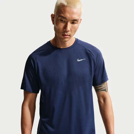 Zdjęcie produktu Męska koszulka z krótkim rękawem do biegania Dri-FIT ADV Nike Stride - Niebieski
