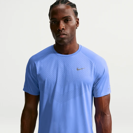 Zdjęcie produktu Męska koszulka z krótkim rękawem do biegania Dri-FIT ADV Nike Stride - Niebieski