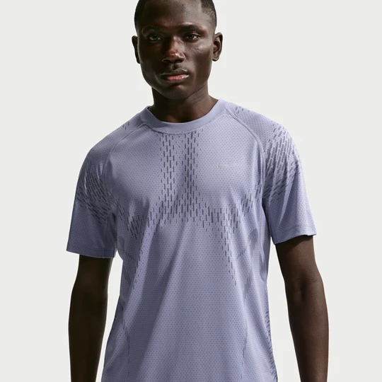 Zdjęcie produktu Męska koszulka z krótkim rękawem do biegania Dri-FIT ADV Nike Stride Plus - Fiolet