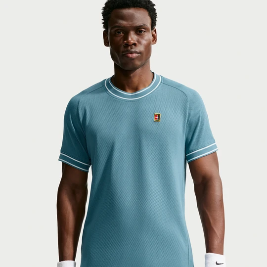 Zdjęcie produktu Męska koszulka z krótkim rękawem do tenisa NikeCourt Heritage - Niebieski