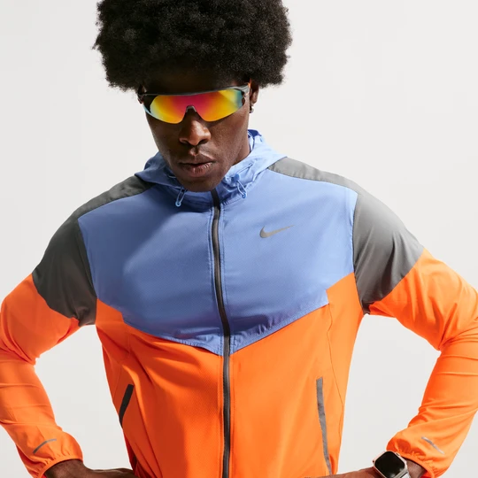 Zdjęcie produktu Męska kurtka do biegania Nike Impossibly Light Windrunner - Pomarańczowy