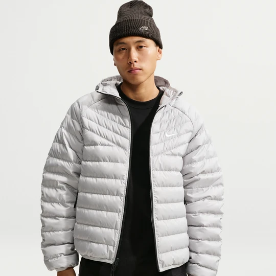 Zdjęcie produktu Męska lekka kurtka puchowa z mikrokanałami Nike Windrunner - Szary
