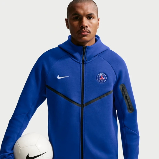 Zdjęcie produktu Męska piłkarska bluza z kapturem i zamkiem na całej długości Nike Paris Saint-Germain Tech Fleece Windrunner - Niebieski