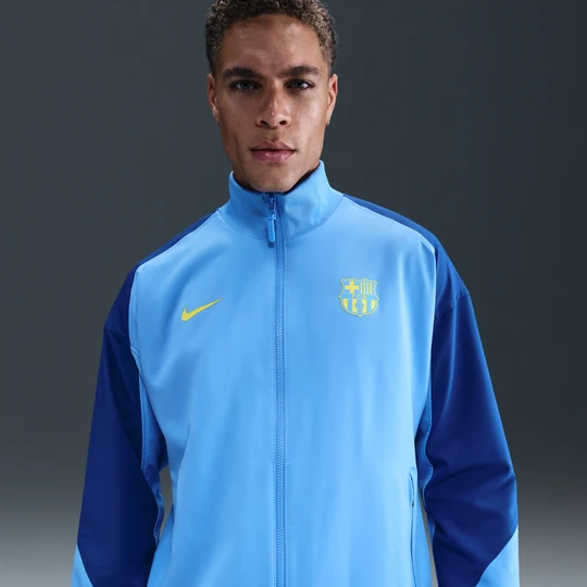 Zdjęcie produktu Męska piłkarska kurtka przedmeczowa Nike Dri-FIT FC Barcelona Strike (wersja czwarta) - Niebieski