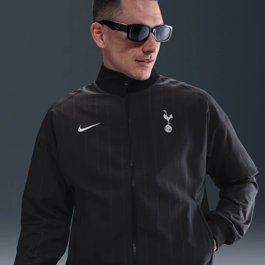 Zdjęcie produktu Męska piłkarska kurtka przedmeczowa Nike Dri-FIT Tottenham Hotspur Strike (wersja wyjazdowa) - Czerń