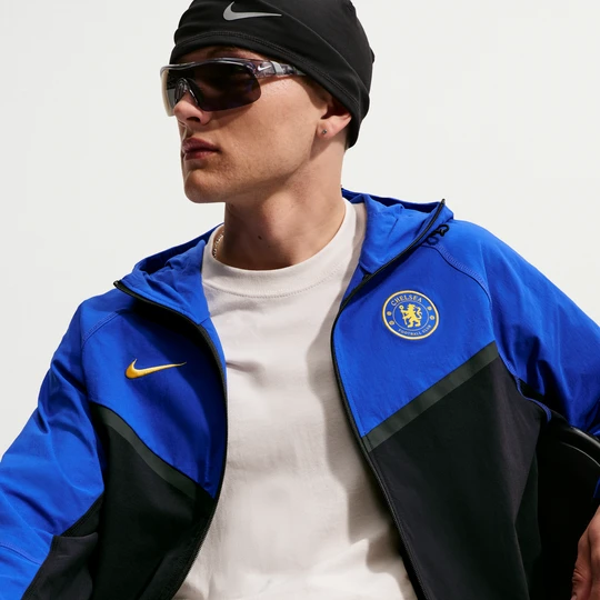 Zdjęcie produktu Męska piłkarska kurtka z tkaniny z zamkiem na całej długości Nike Chelsea F.C. Tech Windrunner - Niebieski