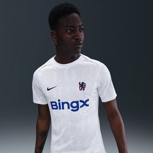 Zdjęcie produktu Męska przedmeczowa koszulka piłkarska Nike Dri-FIT Chelsea F.C. Academy Pro - Biel