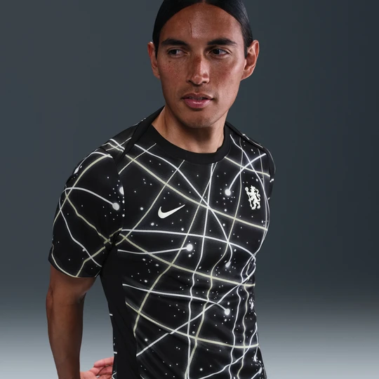 Zdjęcie produktu Męska przedmeczowa koszulka piłkarska z krótkim rękawem Nike Dri-FIT Chelsea F.C. Academy Pro - Czerń