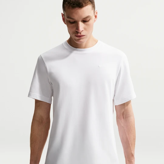 Zdjęcie produktu Męska uniwersalna koszulka z krótkim rękawem Dri-FIT Nike Primary - Biel