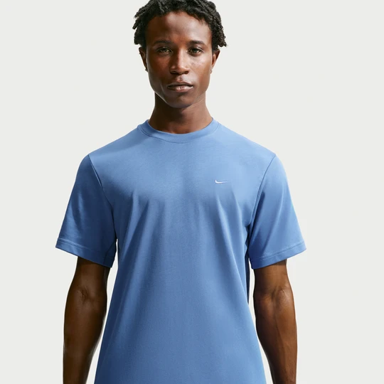 Zdjęcie produktu Męska uniwersalna koszulka z krótkim rękawem Dri-FIT Nike Primary - Niebieski