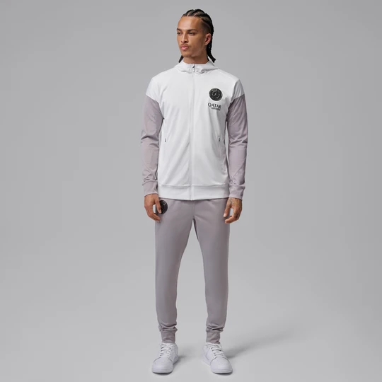 Zdjęcie produktu Męski dres piłkarski z kapturem Jordan Dri-FIT Paris Saint-Germain Strike (wersja nocna) - Biel