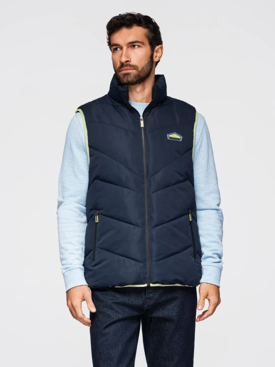 Zdjęcie produktu Męski pikowany bezrękawnik z neonowymi akcentami – granatowy V3 Ombre Clothing
