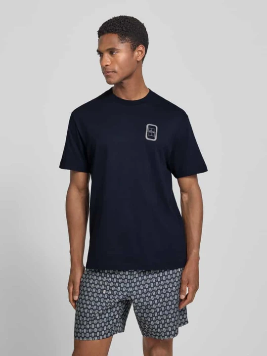 Zdjęcie produktu męski t-shirt o kroju regular fit z czystej bawełny model 'CN Tenniscourt Backprint' Lacoste Granatowy