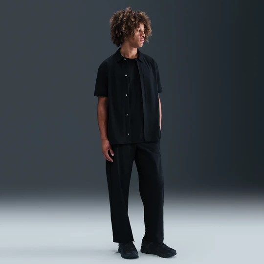 Zdjęcie produktu Męskie chinosy o luźnym kroju Dri-FIT Nike 24.7 PerfectStretch - Czerń