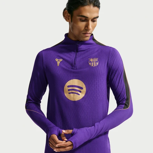 Zdjęcie produktu Męskie dzianinowe spodnie piłkarskie Kobe Dri-FIT FC Barcelona Strike Elite (wersja wyjazdowa) - Czerń Nike