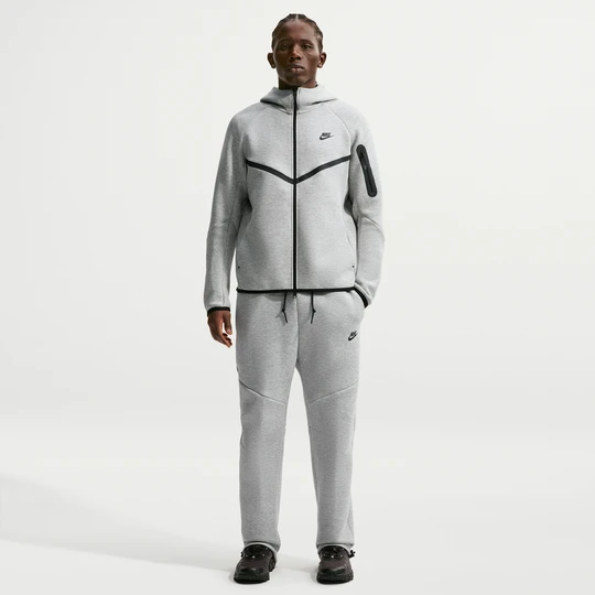 Zdjęcie produktu Męskie dzianinowe spodnie z luźnymi nogawkami Nike Tech - Szary