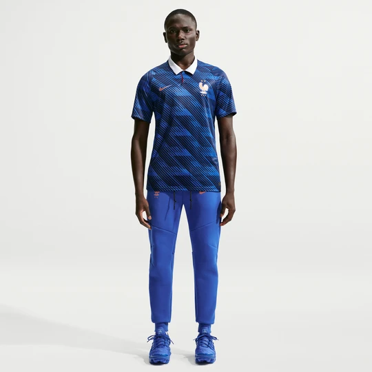 Zdjęcie produktu Męskie joggery piłkarskie Nike FFF Tech Fleece - Niebieski