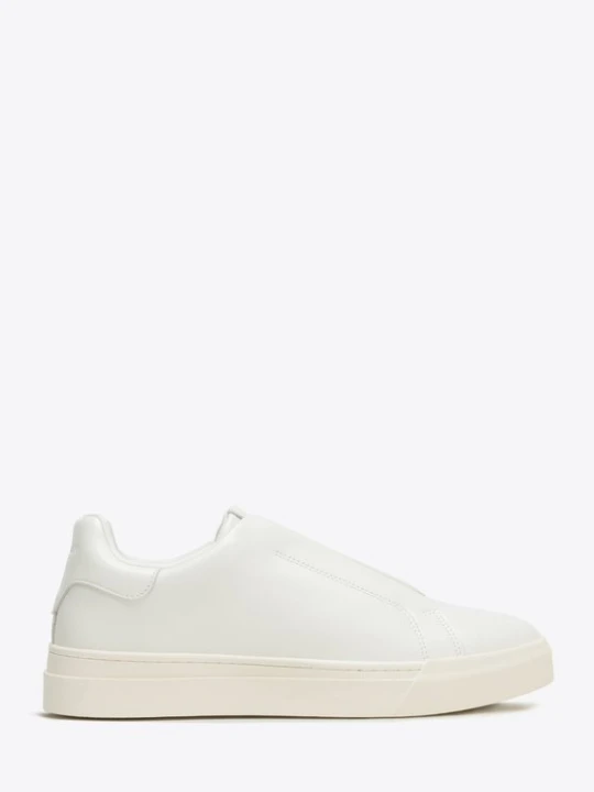 Zdjęcie produktu Męskie sneakersy ze skóry naturalnej wsuwane złamana biel Wittchen złamany biały