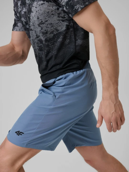 Zdjęcie produktu Męskie spodenki treningowe 4F 4FWSS26TFSHM1278 - denim