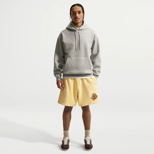 Zdjęcie produktu Męskie spodenki z dzianiny Nike Solo Swoosh - Żółty