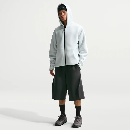 Zdjęcie produktu Męskie spodenki z dzianiny o luźnym kroju Nike Tech - Szary