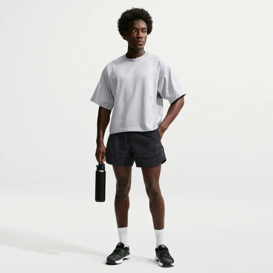 Zdjęcie produktu Męskie spodenki z tkaniny Dri-FIT Nike N.A.C. - Czerń