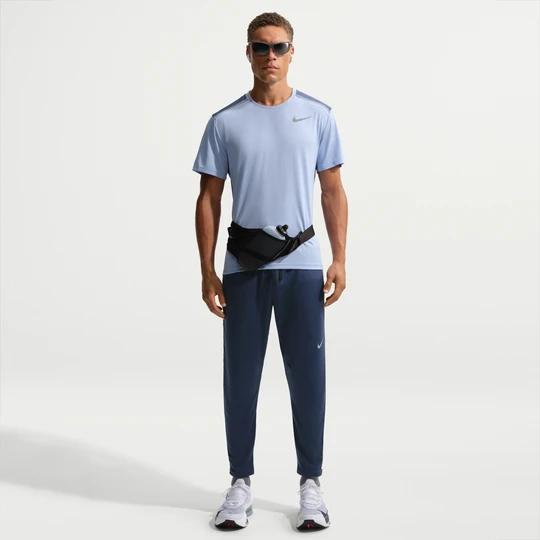 Zdjęcie produktu Męskie spodnie do biegania z dzianiny Dri-FIT Nike Stride - Niebieski