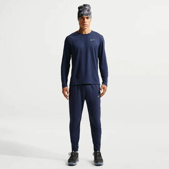 Zdjęcie produktu Męskie spodnie do biegania z tkaniny Dri-FIT Nike Stride - Niebieski