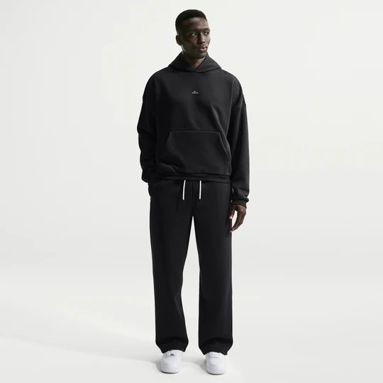 Zdjęcie produktu Męskie spodnie do koszykówki ze szczotkowanej dzianiny z luźnymi nogawkami Therma-FIT Nike Standard Issue - Czerń