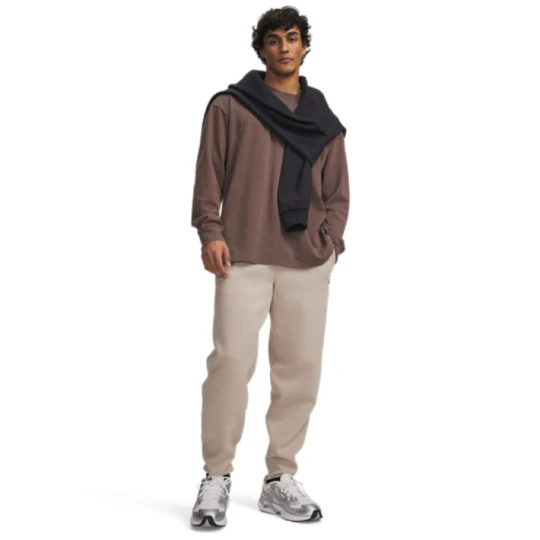 Zdjęcie produktu Męskie spodnie dresowe joggery Under Armour UA Unstoppable Flc Joggers - beżowe