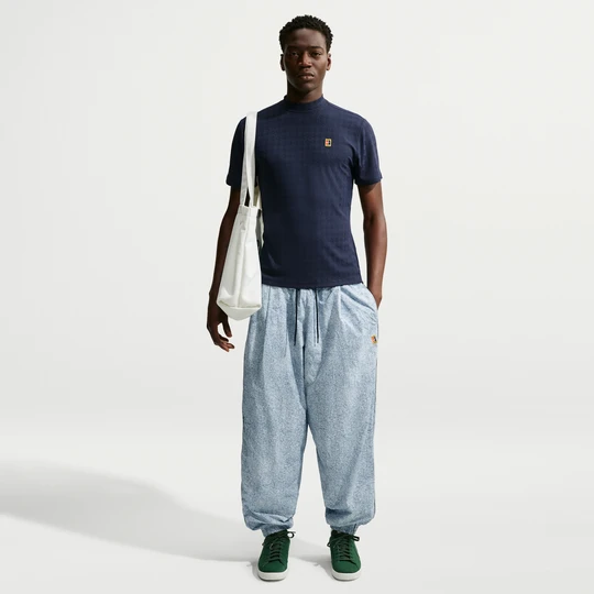 Zdjęcie produktu Męskie spodnie dresowe Nike Club Rules - Biel