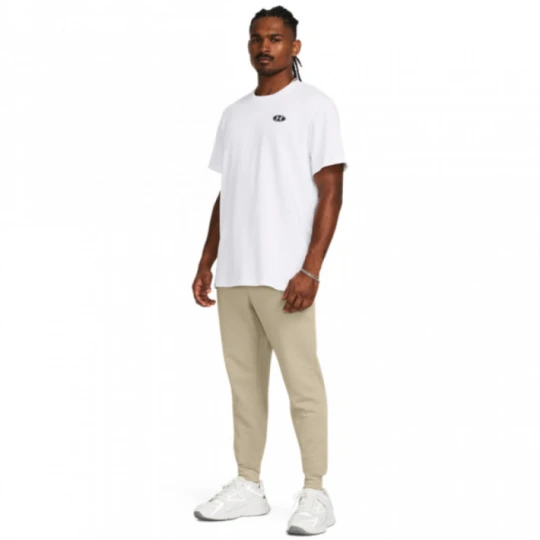Zdjęcie produktu Męskie spodnie dresowe Under Armour UA Rival Terry Jogger - beżowe