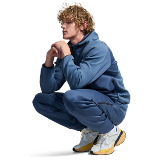 Zdjęcie produktu Męskie spodnie dresowe Under Armour UA Unstoppable Flc Txtrd Jgr - niebieskie