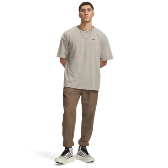 Zdjęcie produktu Męskie spodnie dresowe Under Armour UA Unstoppable Woven Jogger - brązowe