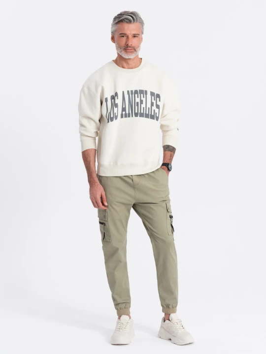 Zdjęcie produktu Męskie spodnie JOGGERY z zapinanymi kieszeniami cargo - khaki V1 - Rozmiar: XL Ombre Clothing