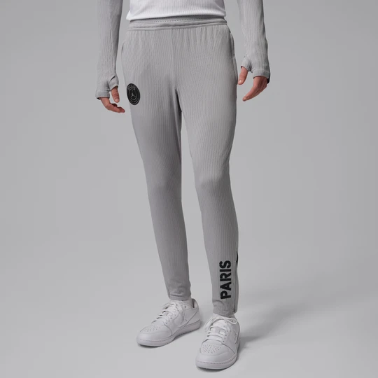 Zdjęcie produktu Męskie spodnie piłkarskie Jordan Dri-FIT ADV Paris Saint-Germain Strike Elite (wersja czwarta) - Szary