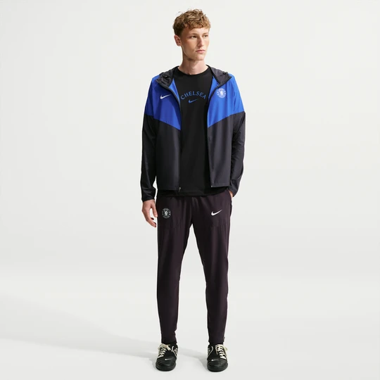 Zdjęcie produktu Męskie spodnie piłkarskie Nike Chelsea F.C. City Side - Niebieski