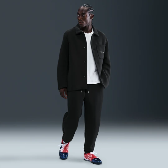 Zdjęcie produktu Męskie spodnie piłkarskie Nike Paris Saint-Germain Tech Fleece - Czerń
