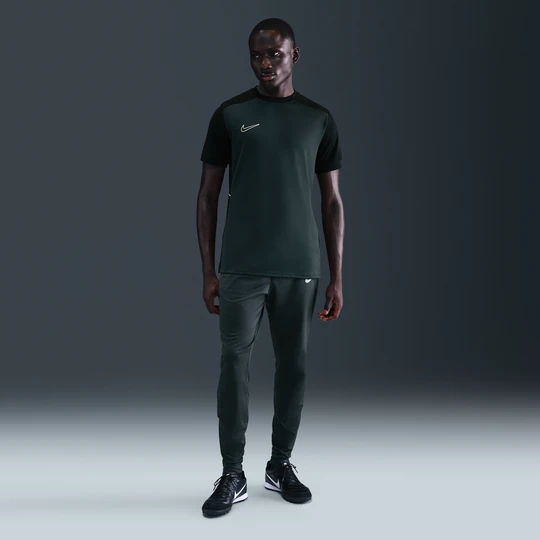 Zdjęcie produktu Męskie spodnie piłkarskie Therma-FIT Nike Strike - Zieleń